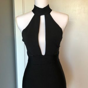Black keyhole body con dress